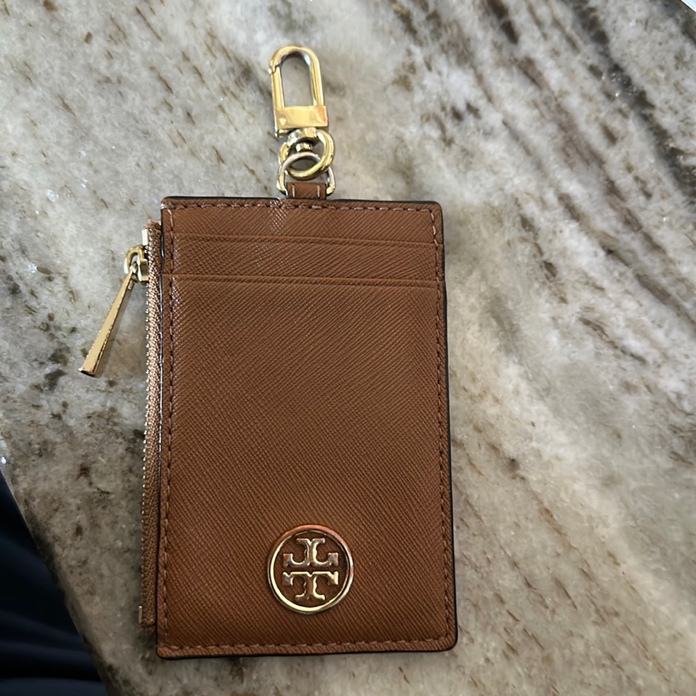 Tory Burch holder with change holder.